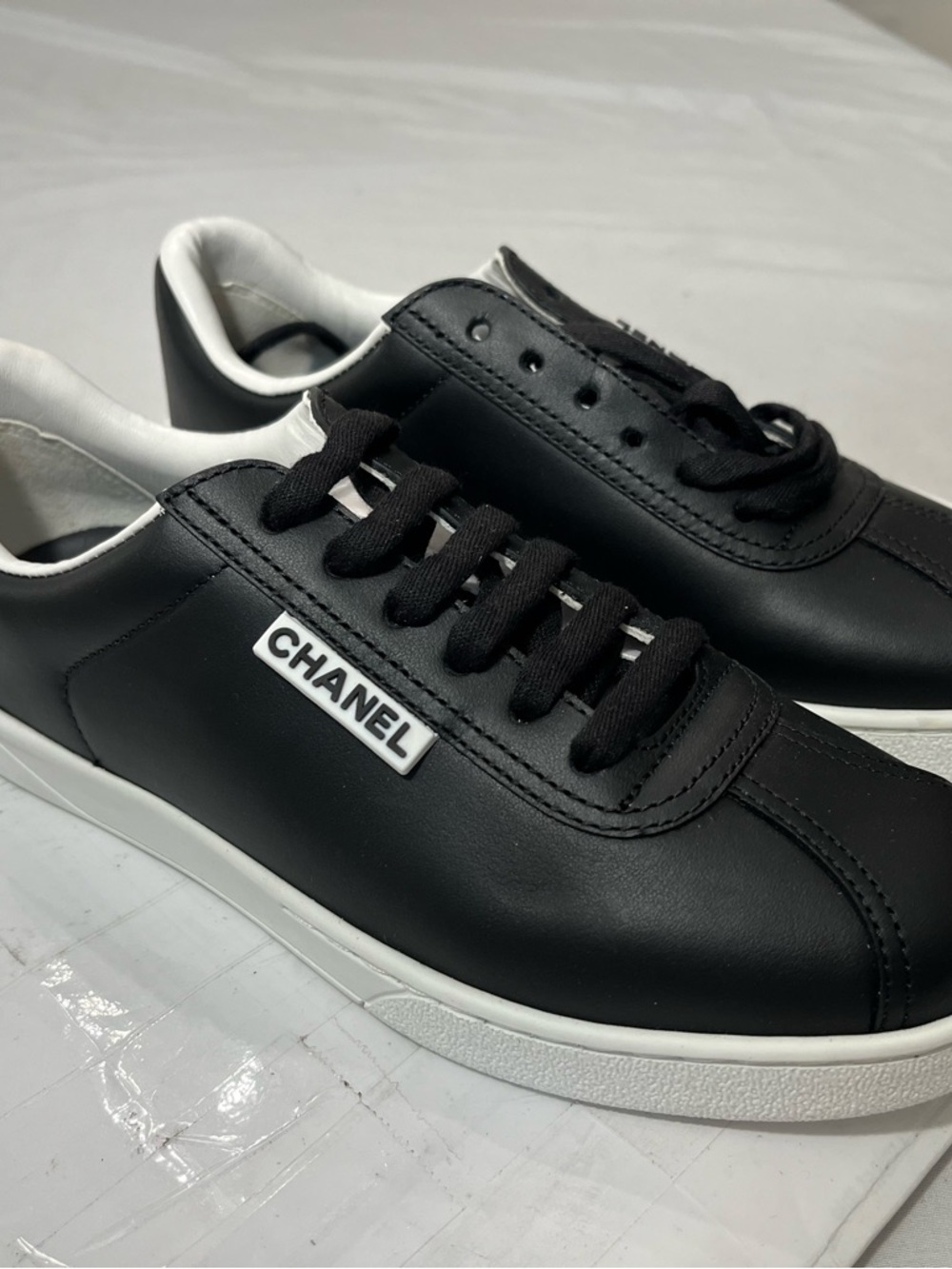 CHANEL Black and White women's Leather Sneakers - Picture 1 of 10